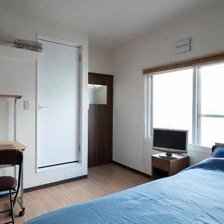 Guesthouse Erimo Apartment Sapporo Bagian luar foto