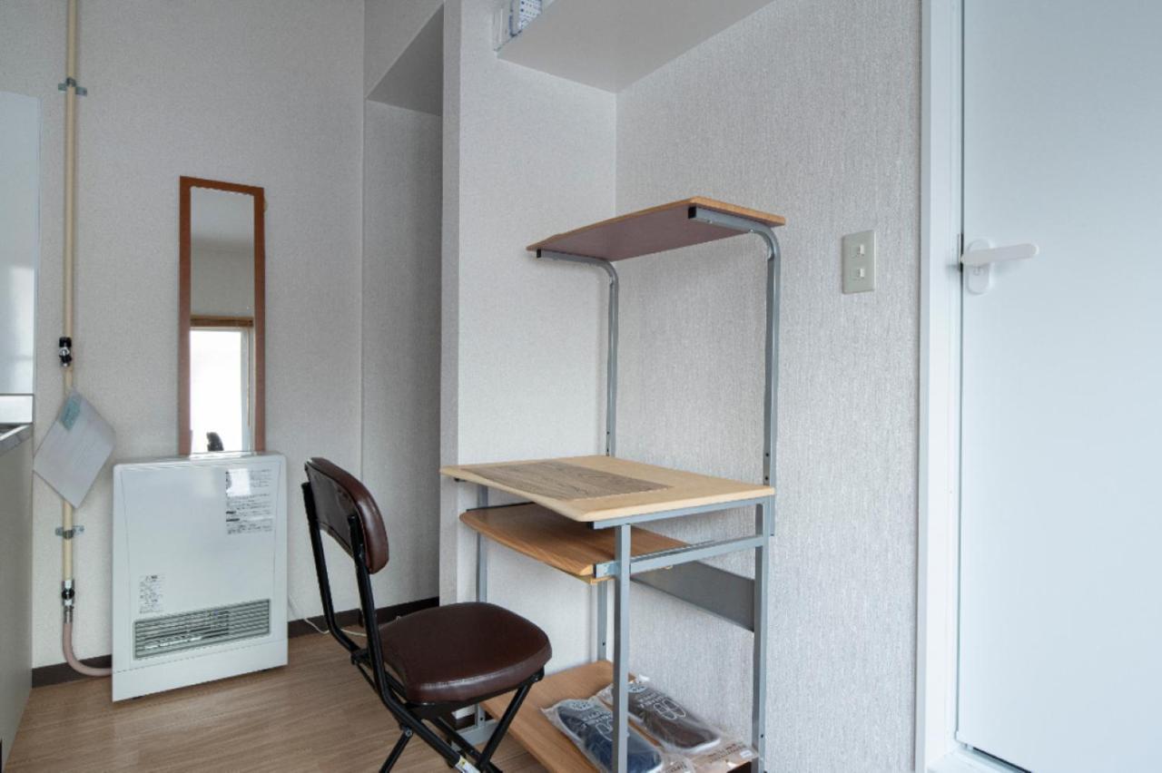 Guesthouse Erimo Apartment Sapporo Bagian luar foto