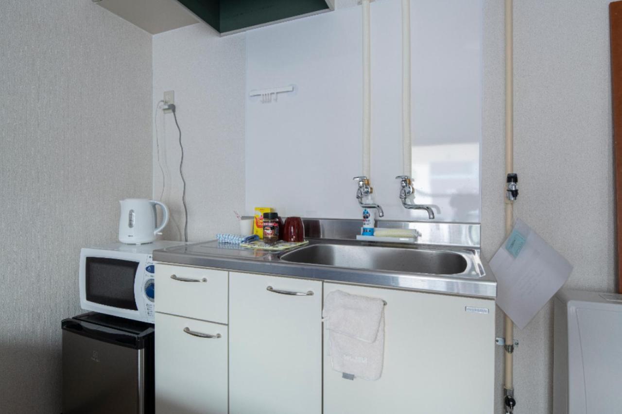 Guesthouse Erimo Apartment Sapporo Bagian luar foto