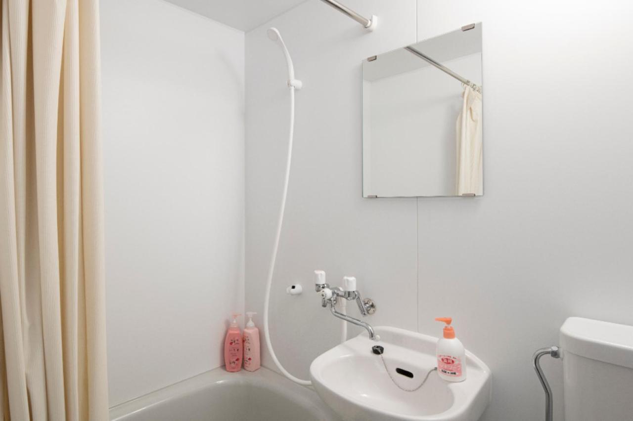 Guesthouse Erimo Apartment Sapporo Bagian luar foto